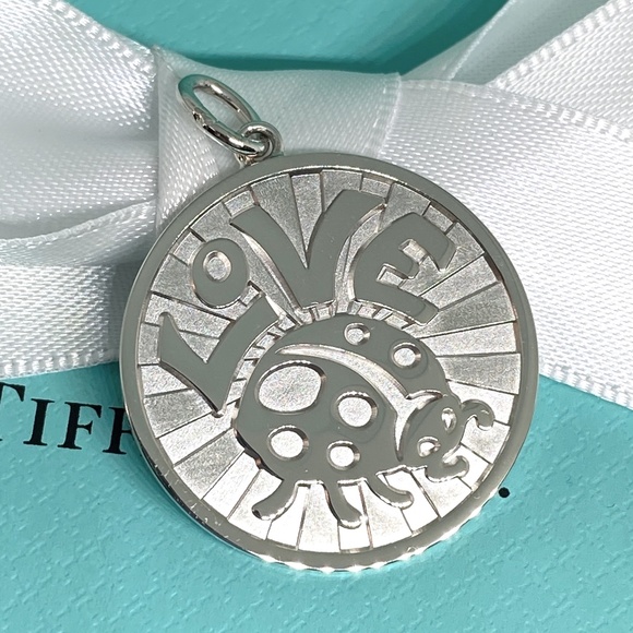 Tiffany & Co. Jewelry - NWT Tiffany and Company love bug round coin charm with pouch and box  lady bug